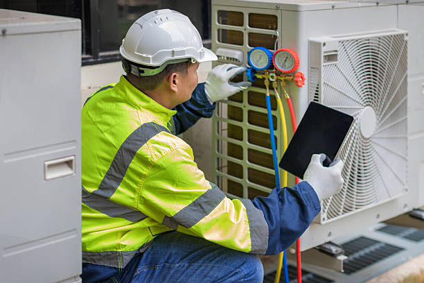 Professional Air Conditioning Repair technician working in Attica, NY